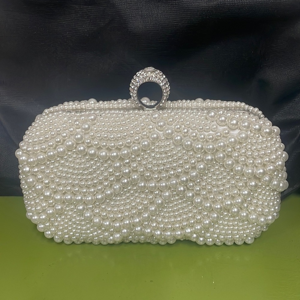 Comel simulated pearl clutch